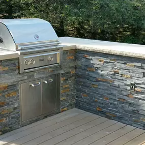 Take your grilling game to the next level with an outdoor kitchen. Contact Spear's Landscape to get started!