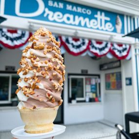 Jacksonville Ice Cream San Marco Dreamette located at 1905 Hendricks Ave., Jacksonville, FL 32207 serves a chocolate twist waffle cone with peanut sprinkles
