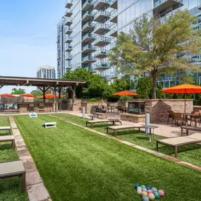 Outdoor games and seating including bocce ball.