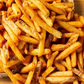A close-up view of regular order of Five Guys fries.