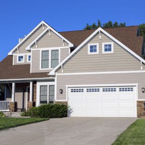 Siding installation by Home Genius Exteriors – Elevating your home’s appearance and durability.