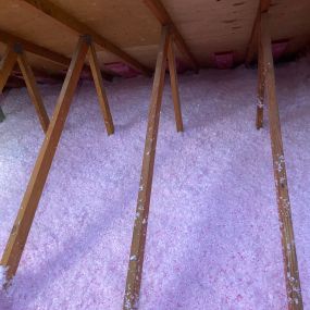 Attic insulation installation by Home Genius Exteriors – Boosting energy efficiency and reducing utility bills.