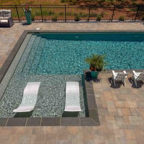 Transform your poolside experience with our expertly crafted outdoor paver patios, designed to enhance the beauty and functionality of your pool area. At HCE Site Maintenance, we specialize in creating stunning hardscaping solutions tailored to the unique needs of homeowners at the Delaware Beaches and throughout Delmarva.