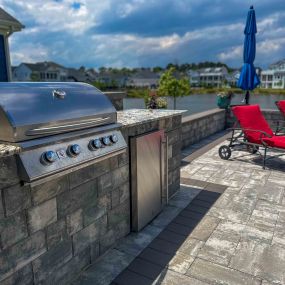 Transform your backyard into the ultimate culinary retreat with our bespoke outdoor kitchens and dining areas. From sizzling grills to stylish dining sets, create memorable moments and indulge in al fresco dining at its finest