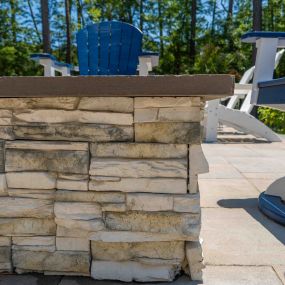 Elevate your outdoor living with stunning paver patios, inviting outdoor lounging spaces, and cozy fire pits. Discover the perfect blend of style and functionality for your backyard oasis with our expert hardscaping services.