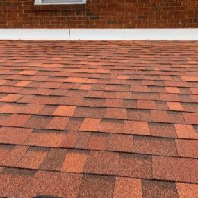 Residential roofing with meticulous craftsmanship and durable materials.
