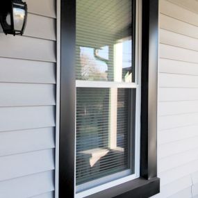 Upgrade to energy-efficient windows with Home Genius Exteriors – Enhancing comfort and reducing energy costs.