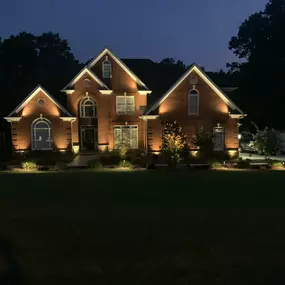 house with exterior lighting installed by Ways Electric