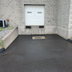 The client wanted to replace catch basin to keep parking lot from eroding.  CDS Asphalt Services repointed and patched around the catch basin, saving the client thousands of dollars and a day of downtime due to being unable to use the loading dock.