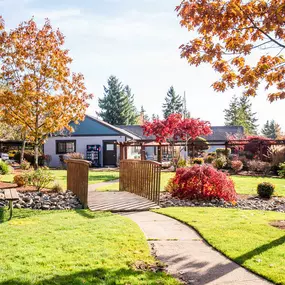 Community Picnic Tables and Clubhouse Exterior