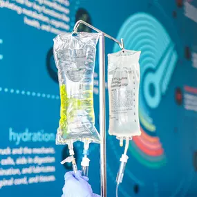 IV Drip Bags hanging from IV rack.