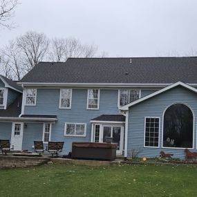 Complete roofing and siding replacement for a residential property.