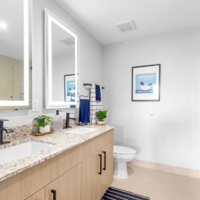 Bathrooms with LED Mirrors at The Marc Luxury Apartments in Palm Beach Gardens FL