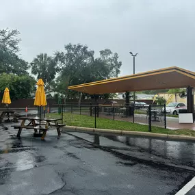 Covered & open-air seating at Kahwa Coffee Gandy