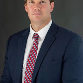Michael Ellis was raised in Conway, South Carolina.  After graduating from Conway High School, Michael attended the University of South Carolina from which he graduated with a bachelor’s degree in economics.