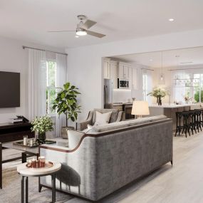 Wood-style flooring throughout the open-concept living room with designer ceiling fans.