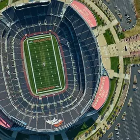 This color aerial image of the Denver Broncos stadium in Denver, Colorado, captured by Synergy Mapping, provides critical data for the Engineering & Construction industry. It aids in project planning, infrastructure assessment, and site development.