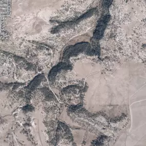 This large-format aerial image of Colorado, captured by Synergy Mapping, Inc., provides vital data for the Environmental Conservation industry, aiding in land management and ecosystem monitoring.