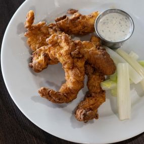 chicken fingers on a plate