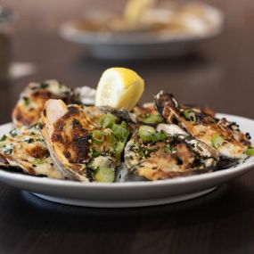 Baked oysters on a plate