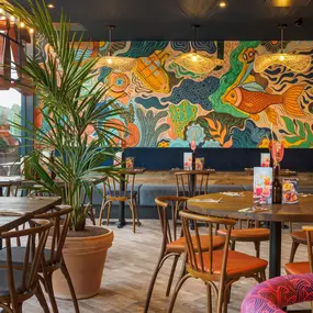 Zizzi Chatham, rustic-modern interior with warm lighting