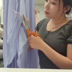 Behind the seams: Witness the magic of our expert alterations.