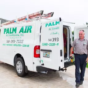 Palm Air Air Conditioning, Inc. white van in the driveway