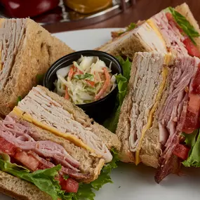 Club Sandwich. Myron’s Delicatessen® doles out an extra helping of New York culture complete with humor, artwork, and music along with the best corned beef, pastrami, and classic delicatessen fare. You’ll get your fill of fun and food, guaranteed. Find all the Myron Cohen slogans that decorate the delicatessen and the waitstaff’s uniforms, including his famous “Everybody gotta be someplace” and “It’s not a question.