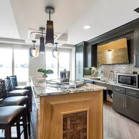 The kitchen and dining area at Westwood Green Apartments create an inviting space for cooking and entertaining.
