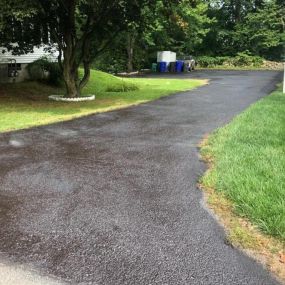 Seal coated driveway done by Anchor Paving and Seal Coating