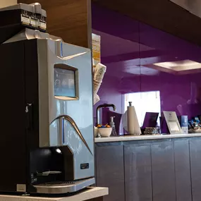 Coffee machine in the Holman INFINITI service center waiting area