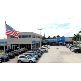 Exterior photo of the Holman Honda dealership and service center