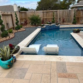 Custom pool with tanning ledge