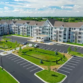 Aerial view of the apartment building with parking spaces