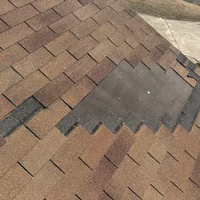 A trusted insurance agent pointed his client our way, aware of our reputation for straight-shooting advice. We took a look at the situation and found a few missing shingles on the house, but overall the roof was holding up quite well. So here's our professional two cents - there's no need for a comp