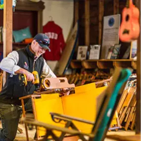 Owner of Cape Cod Beach Chair, Justin Labdon designing and producing one of his world-class beach chairs in the Harwich, MA workshop