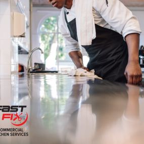 man cleaning counter after a appliance replacement with Fast Fix