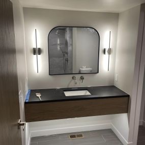 Enhance your bathroom ambiance with expert lighting from Lyons Electric Co.