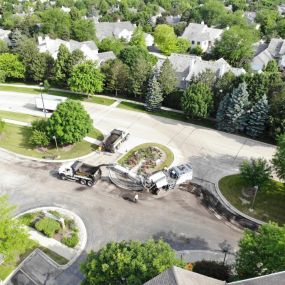 Aerial view of a neighborhood and the roads going through it.