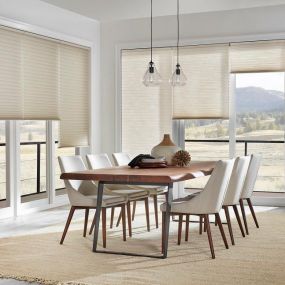 . Let the light peek in without compromising your privacy. These modern  Honeycomb Shades  keep your dining room bright and perfectly private so that you can focus on family time.  #BudgetBlindsParamusWestwood #HoneycombShades #ShadesOfBeauty #FreeConsultation #WindowWednesday