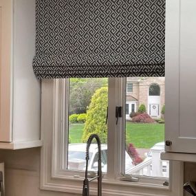 We are in love with this Roman Shade!!! Window treatments can dress up any space. Call Budget Blinds today for your custom shades!