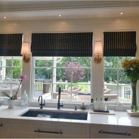 Faux Roman Valances & Roman Shades complete this beautiful kitchen. We worked with designer Kristen Sawyer on this beautiful space. #romanshades #valances #beautifulkitchens #kitchendecor