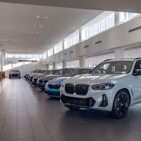 The showroom of BMW of Ft Lauderdale with BMW models lined up