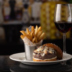 Finished with Jarlsberg cheese, our Wagyu Mushroom and Swiss Burger pairs well with Migration Sonoma Coast Pinot Noir, an elegant wine with subtle flavors of cedar and cassis. Join us in our lounge for Wagyu & Wine now through November 1.