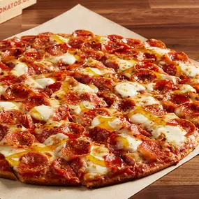 Family recipe pepperoni, smoked Provolone, fresh mozzarella, crushed red pepper and Mike's Hot Honey®