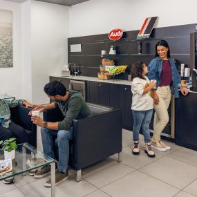 Family in the lounge at Audi Pembroke Pines