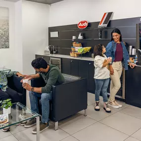 Family in the lounge at Audi Pembroke Pines