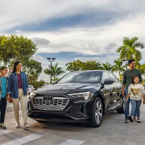 Family outside with there New Audi at Audi Pembroke Pines