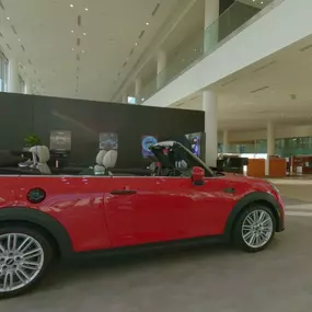 A red MINI in the Lauderdale MINI showroom