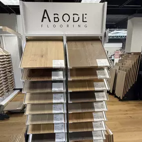 Flooring samples of Abode by Kentwood displayed in the Focal Point Flooring showroom in Otsego, MN